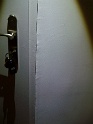 huisserie et mur de la porte d'entrée (en lumière rasante)