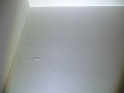 peinture du mur (à la queue de vache? avec des bouses, oui!) (en lumière rasante)