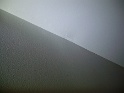 séjour: enduit entre mur et plafond (en lumière rasante)