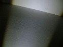 grande chambre: lissage de la cloison, coulures de peinture (en lumière rasante)
